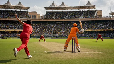 Daytime T20 cricket match in a packed Chennai stadium with red and orange supporters