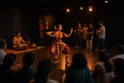 Intimate Chennai performing arts space with a classical dancer and warm stage light