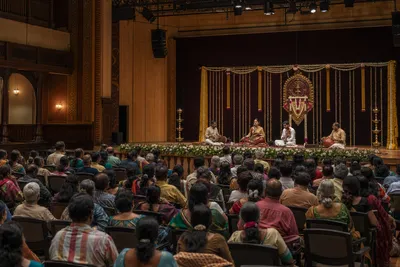 Carnatic music ensemble performing in a grand Chennai auditorium during December Season